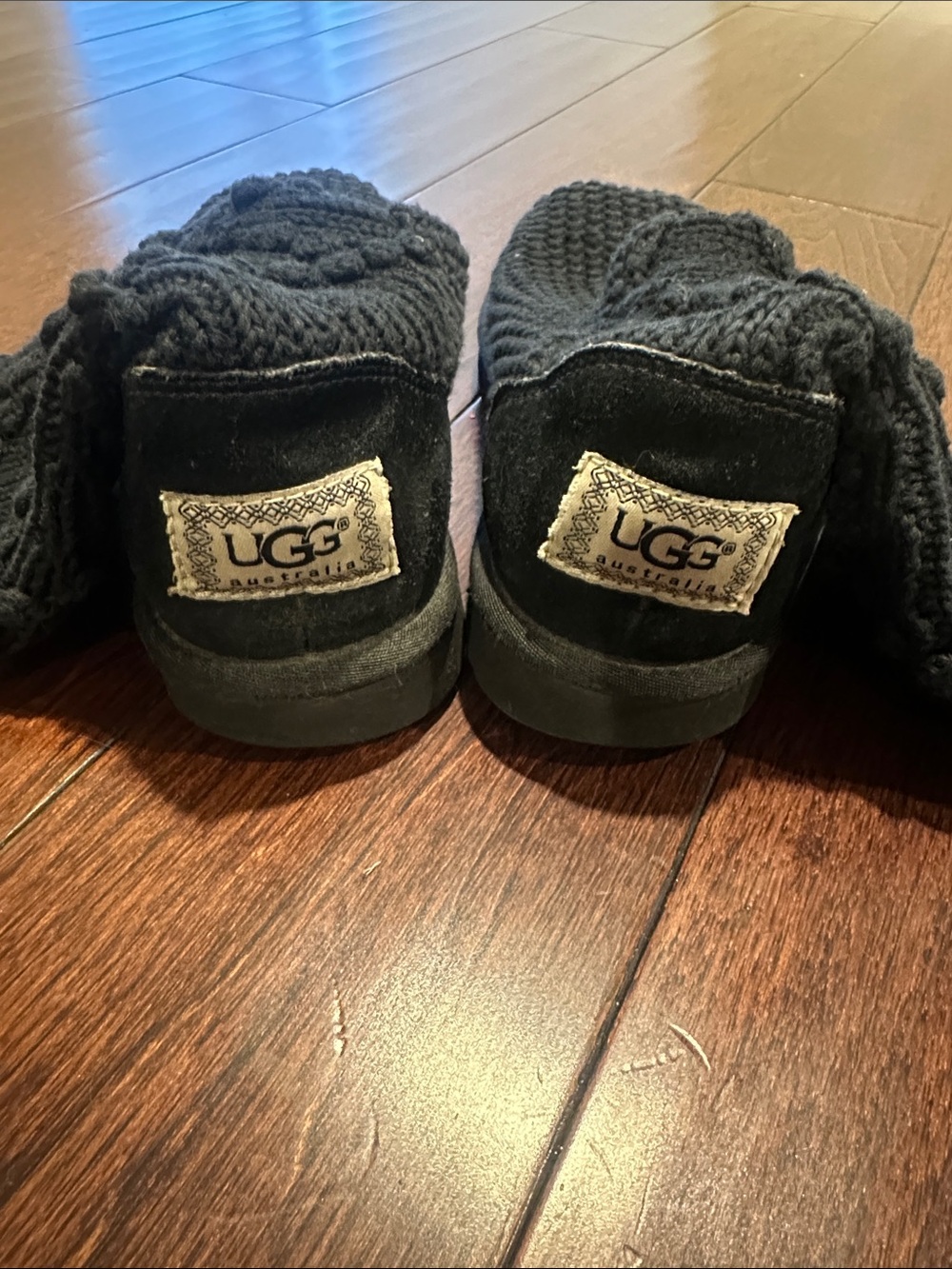 UGG Black Knit Slip-On Booties with Suede Heel Patch